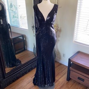 Black Sequined Evening Gown.